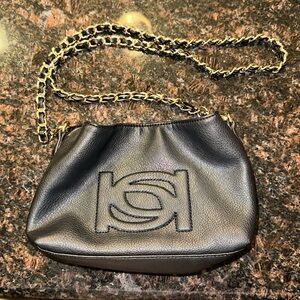 Bebe small black purse w gold chain.
